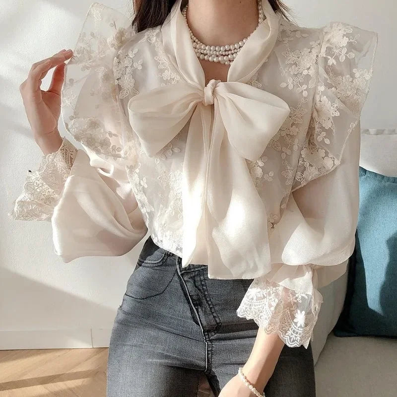 French lace high-grade bow shirt women's spring and autumn new fashion temperament slim casual Joker high waist top.