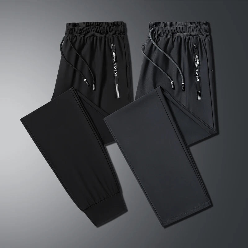 New Summer Korean Ice Silk Elastic Trousers Cool Thin Casual Men'S Loose Long Large Size Small Foot Sports Pants 8XL