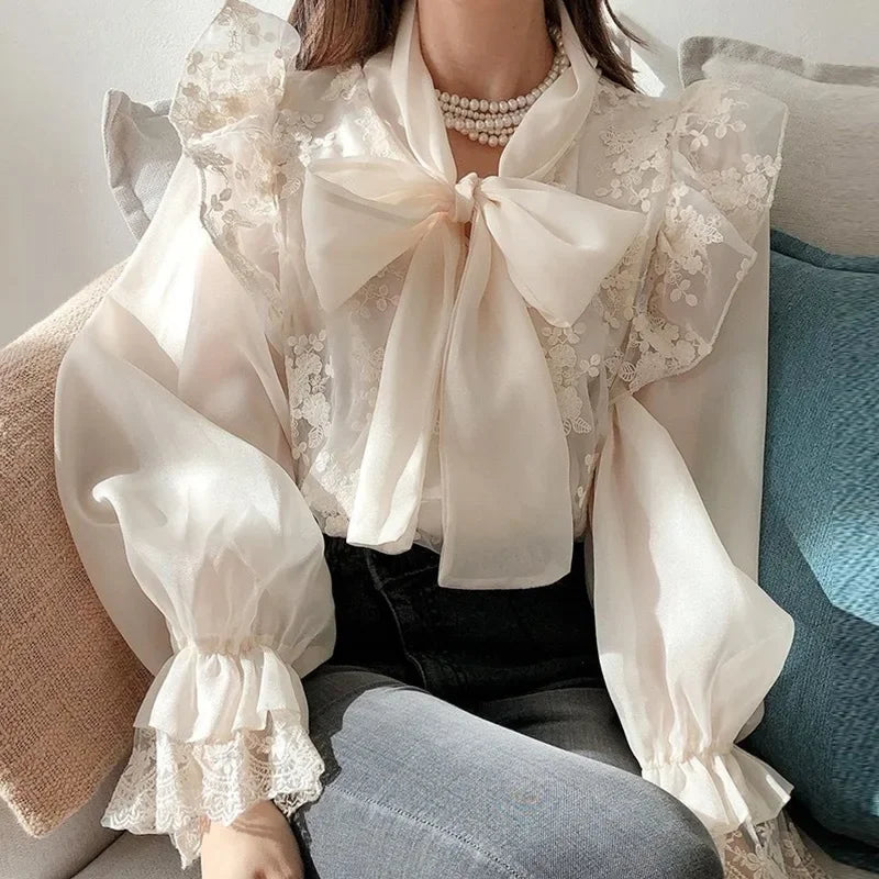 French lace high-grade bow shirt women's spring and autumn new fashion temperament slim casual Joker high waist top.