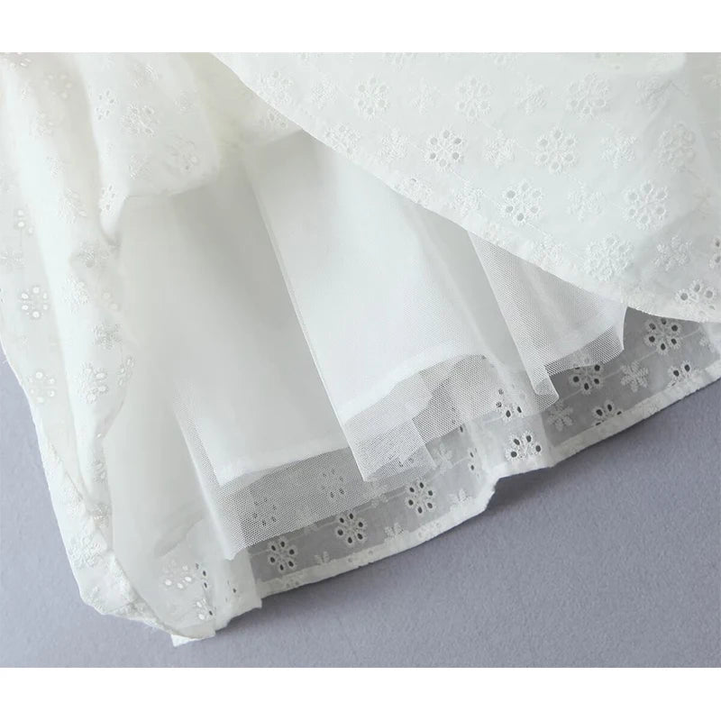 YENKYE Sexy Women Fashion Hollow Out Embroidery Sling White Dress Summer Sleeveless  Low Waist Female Party Mini Dresses