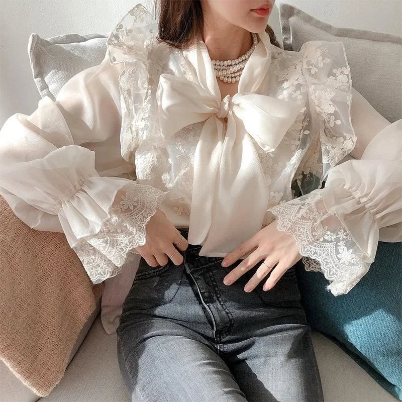French lace high-grade bow shirt women's spring and autumn new fashion temperament slim casual Joker high waist top.