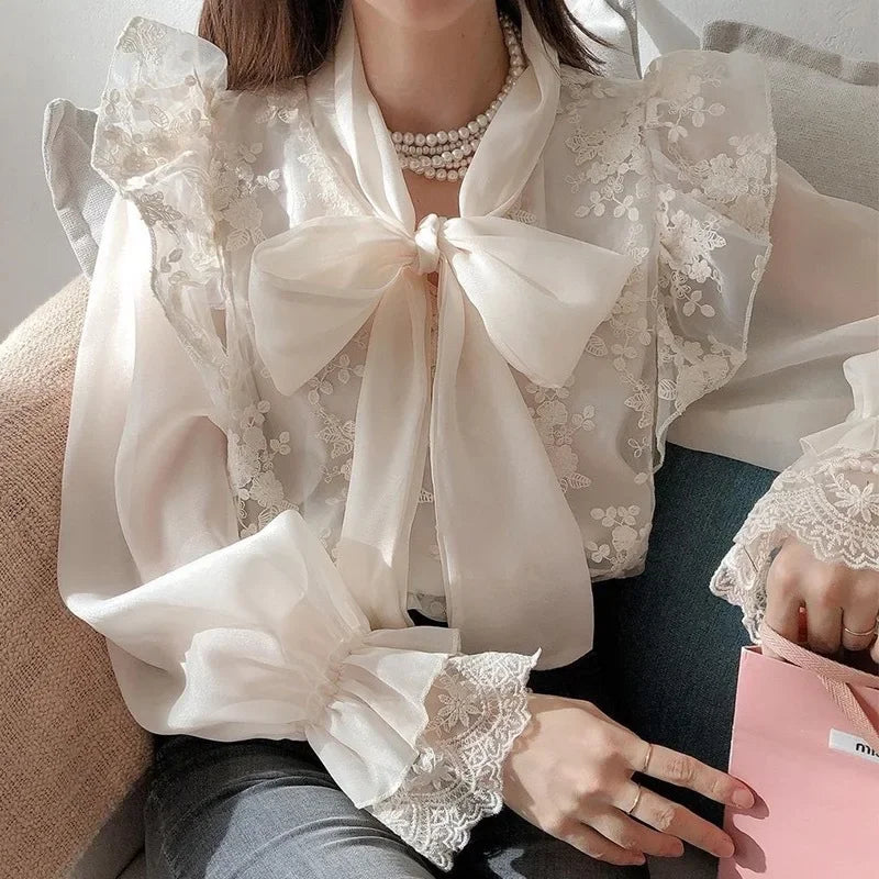 French lace high-grade bow shirt women's spring and autumn new fashion temperament slim casual Joker high waist top.