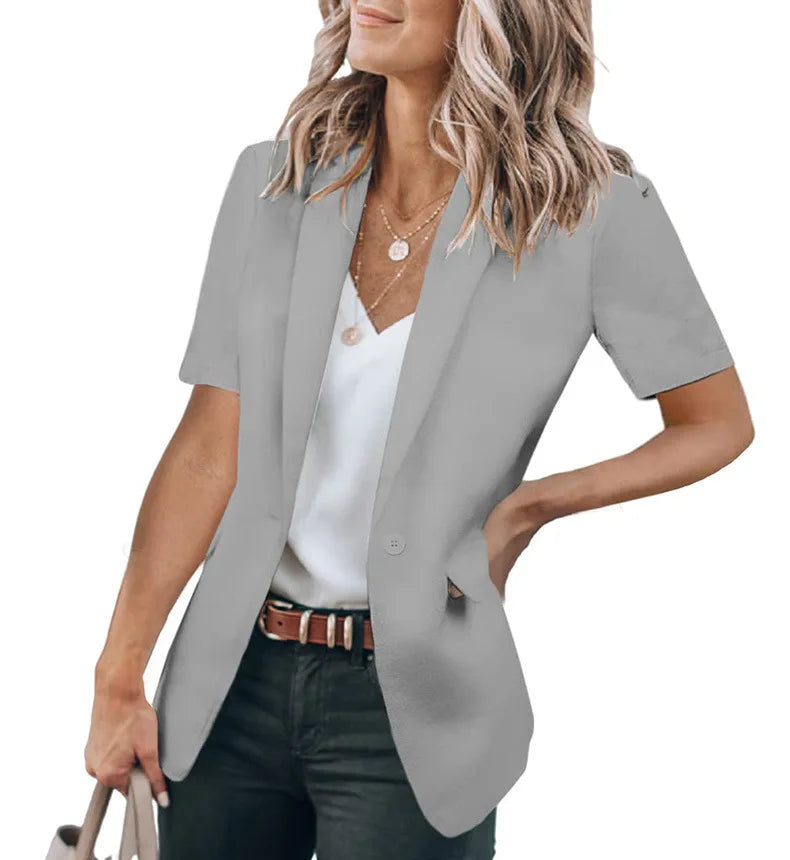 Summer women's temperament, fashionable and loose fitting small suit, European and American solid color suit collar, short sleev