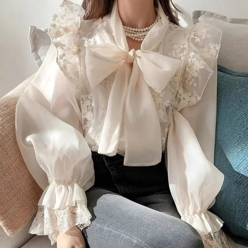French lace high-grade bow shirt women's spring and autumn new fashion temperament slim casual Joker high waist top.