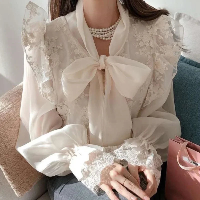 French lace high-grade bow shirt women's spring and autumn new fashion temperament slim casual Joker high waist top.